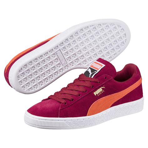 women red puma sneakers.